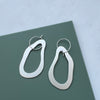 Minimal Wave Silver Hoop Earrings